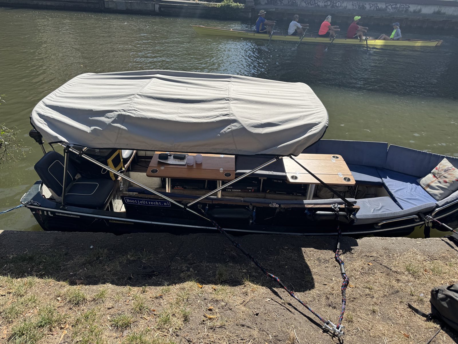 The bimini top fully covering the boat, seen from above